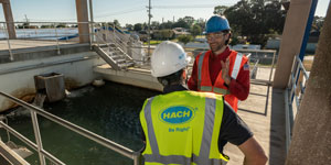 Water technician consulting with Hach on remote monitoring